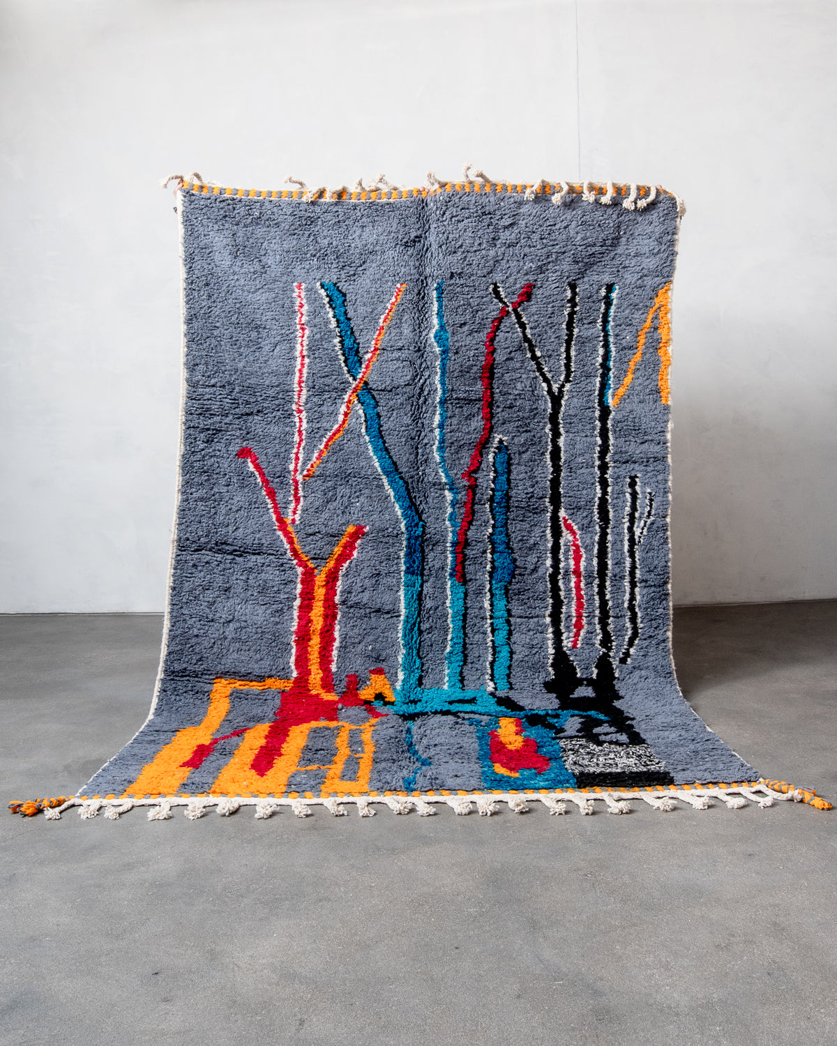Modern, designer, handcrafted Berber rug from Morocco. Beniourain carpet with beautiful colours and patterns and fluffy wool texture.